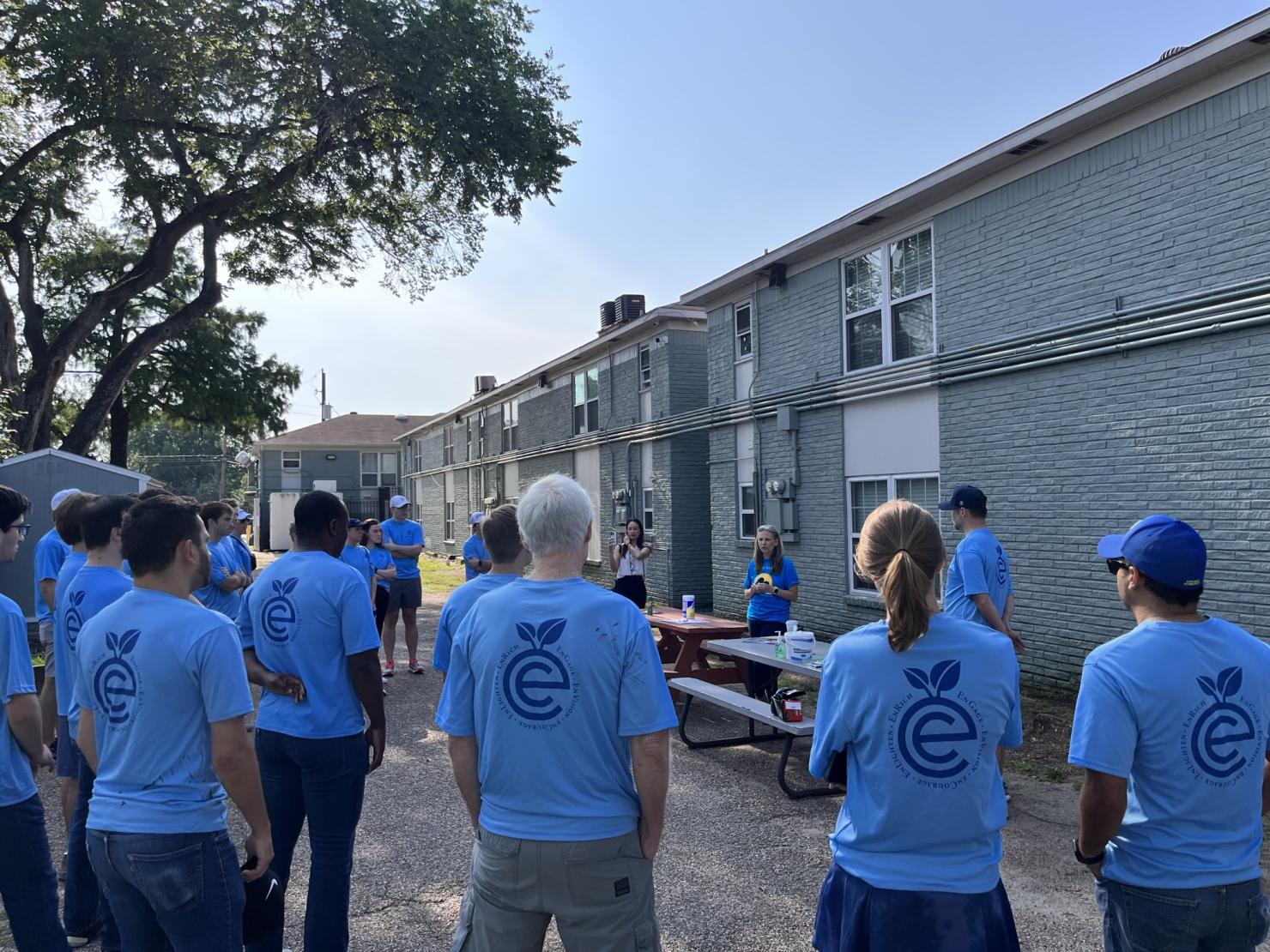 Employees learn more about Santa Maria’s Jacqueln House location and break into groups to begin repairs with the help of Chief Development and Communications Officer - Rachael Wright.